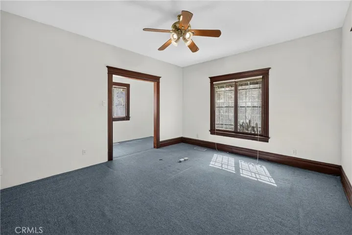 Opens to storage area or closet