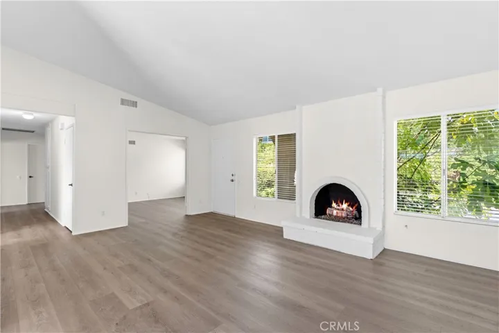 Open space gives welcoming appeal.  Ceilings newly painted as well.