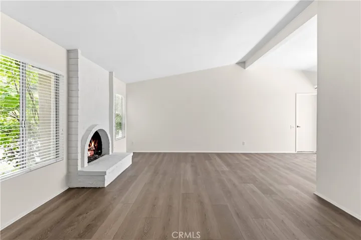Freshly painted interior complete with new luxurious vinyl flooring in living room