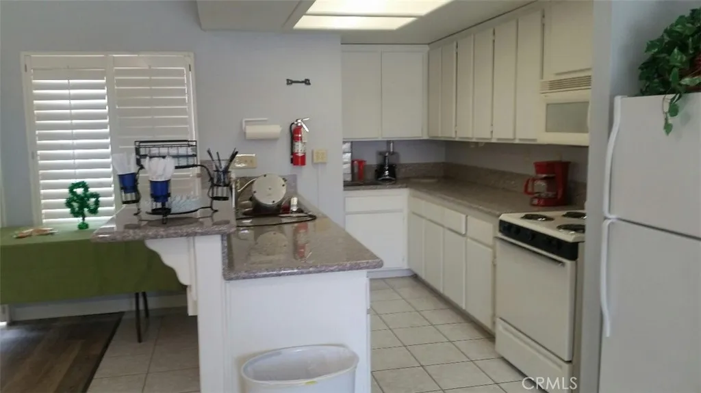 FULL KITCHEN OPEN TO HOMEOWNER FUNCTIONS'