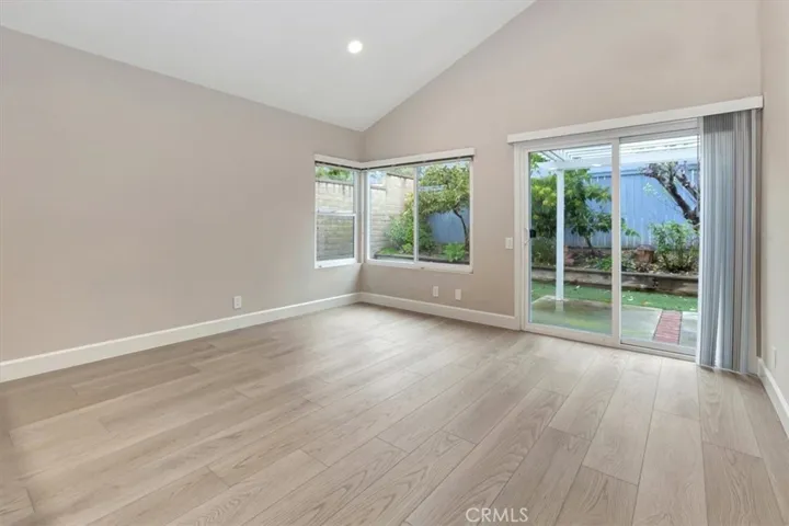 Family room - sliding door to back yard, so much natural light, recessed lighting as well!!