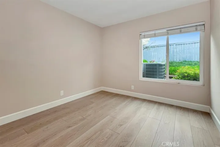 3rd bedroom with back yard view