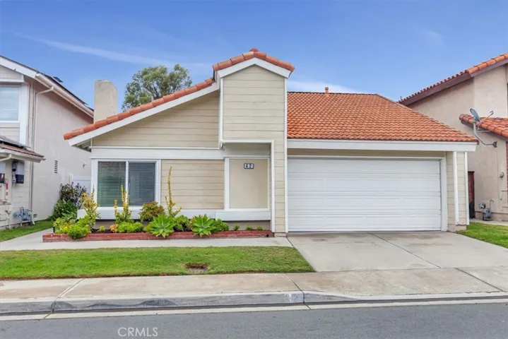 DARLING HOME!  Single level, driveway, 2-car garage, 3 bedrooms, 2 baths, including separate family room!!