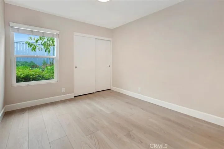 2nd bedroom with view back yard