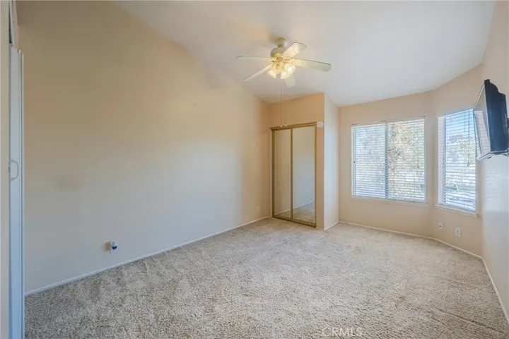 An expansive and brightly illuminated MBR featuring the stunning view of the community area