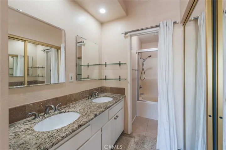 Master bedroom features dual vanity sink