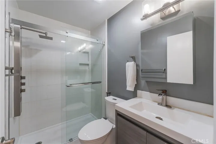 The upper shared bathroom has been highly upgraded