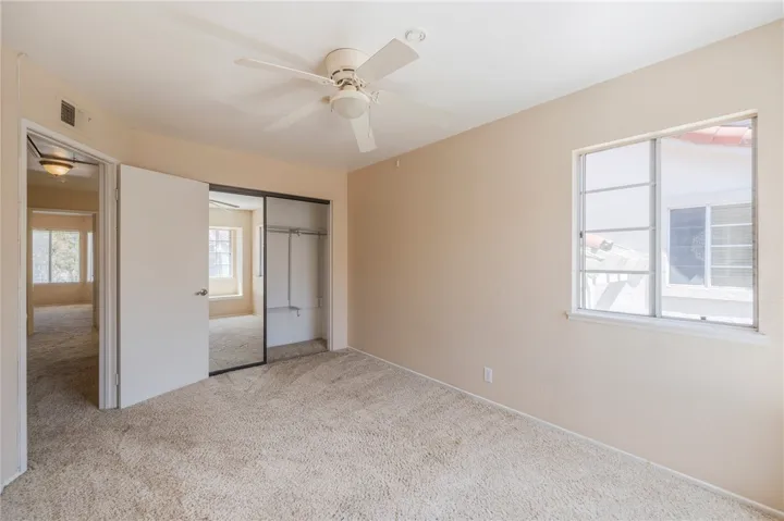 Second bedroom featuring a spacious closet.