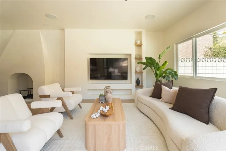 Large living Room with custom plaster fireplace