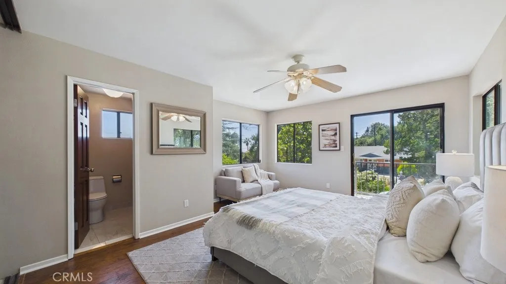 Spacious fourth bedroom located on the second level, featuring a private 3/4 bathroom and stunning, panoramic views.
