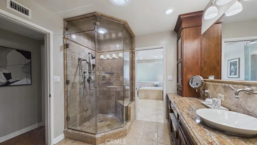 View of hallway bath with oversized custom shower