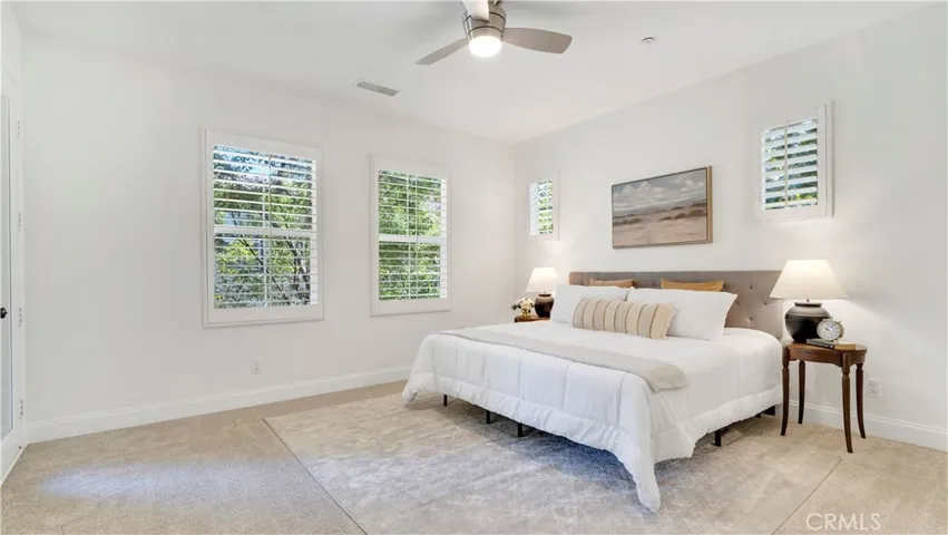 Look at all these windows! New Ceiling fan too.