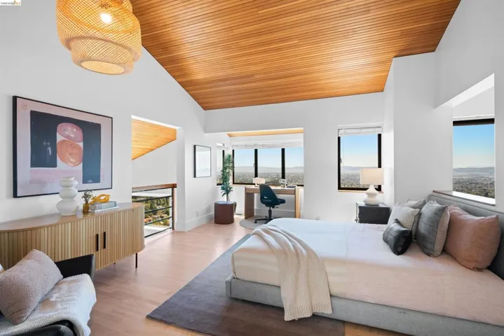 Vaulted wood-paneled ceiling with an integrated light fixture