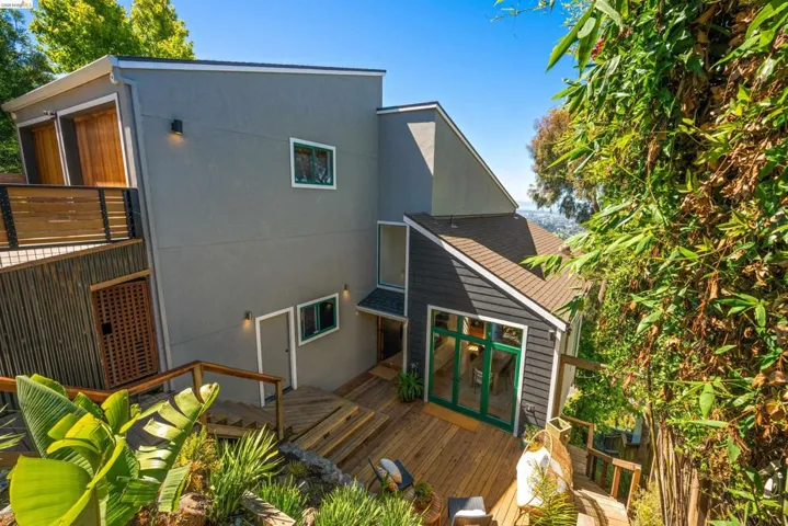 Pitched rooflines and a grand entryway pull you into this Whitaker designed personal residence.