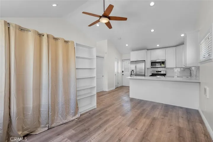 the curtain/bookcase divider is not permanent