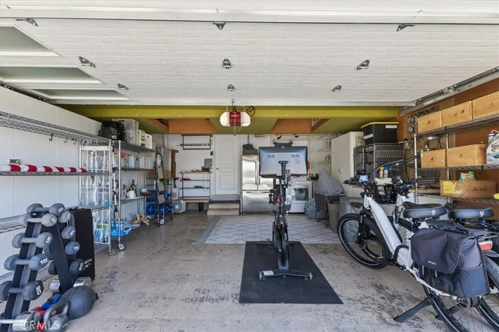 garage w/ pelaton, weights and e-bikes