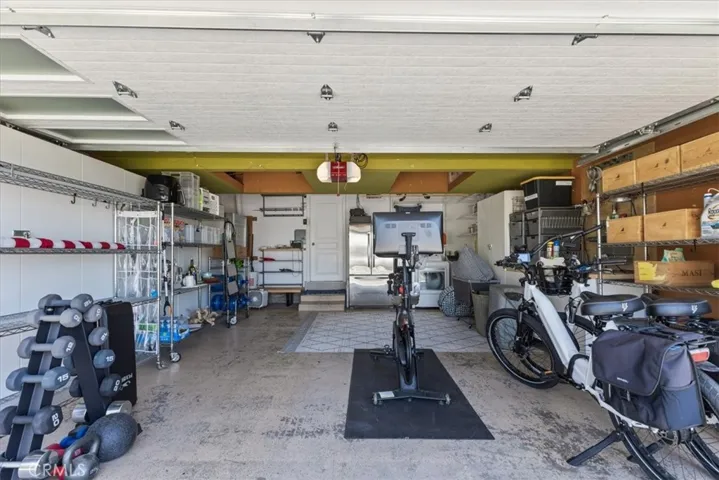 garage w/ pelaton, weights and e-bikes