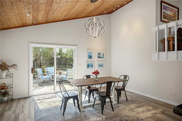 Dining room w/contemporary signature chandelier