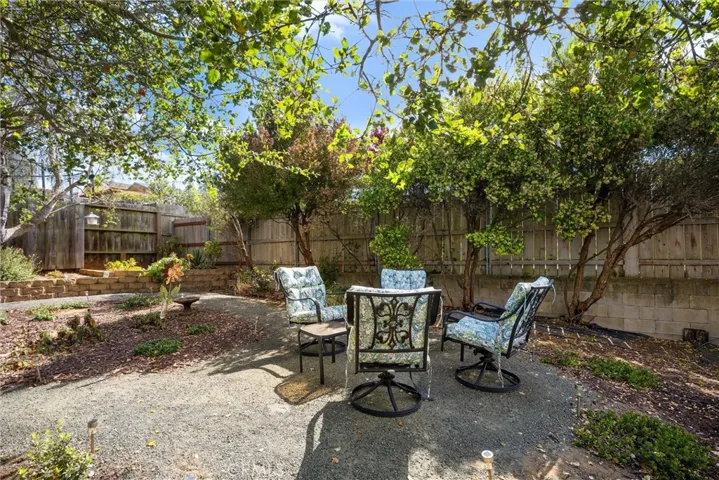 Multiple seating areas throughout the yard