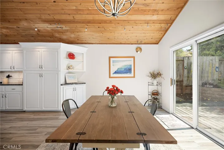 Open from kitchen through dining room to the outdoors