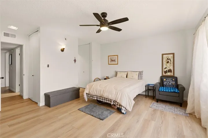 Oversized primary bedroom with walk-in closet.