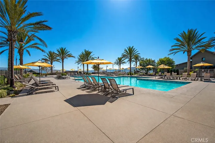 Resort-style pool and adjacent fitness center offering a refined lifestyle close to home.