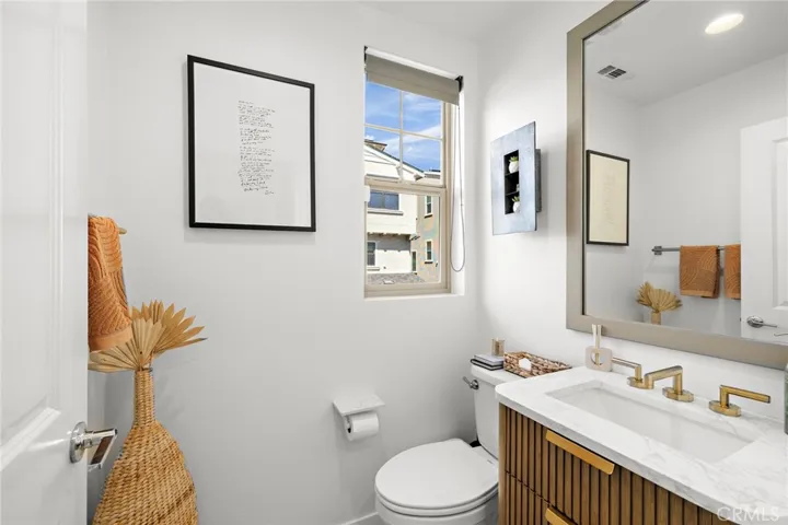 Powder room with elevated finishes and refined styling.