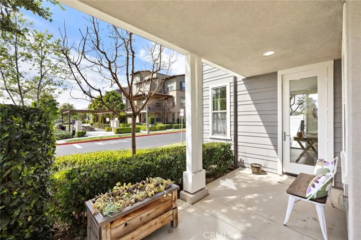 Wraparound side porch offering another inviting area to enjoy views of one of the parks.