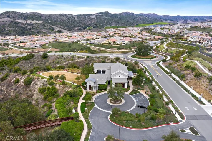 Community center aerial highlighting neighborhood amenities and natural surroundings.