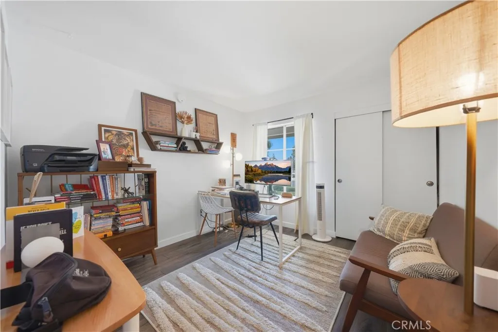 A versatile secondary bedroom offers the flexibility to serve as a home office, guest room, or creative workspace.