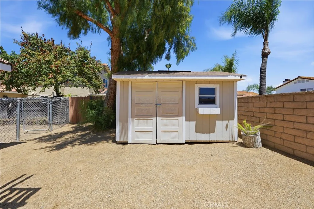 A detached storage shed provides convenient space for tools, seasonal items, and additional storage​​‌​​​​‌​​‌‌​​‌​​​‌‌​​​‌​​‌‌​​‌‌​​‌‌​​​​ needs.