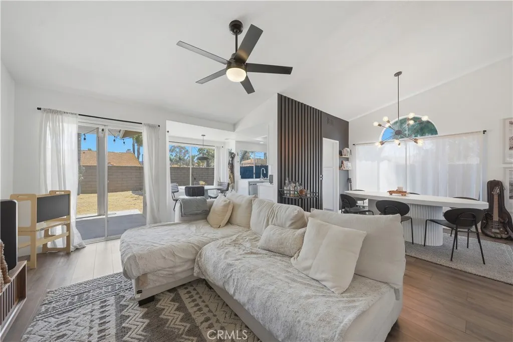 Large windows and a bright, open layout fill the space with natural light throughout the day.