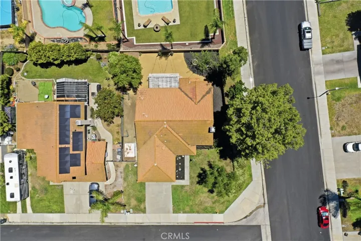 A bird’s-eye view highlights the home's premium corner lot location, generous yard space, and well-positioned footprint within the neighborhood.