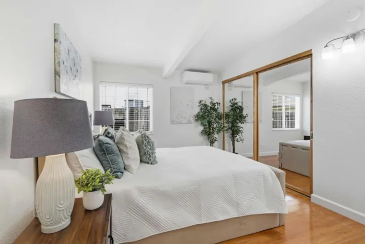 Spacious downstairs primary suite with and a peaceful, light-filled atmosphere.