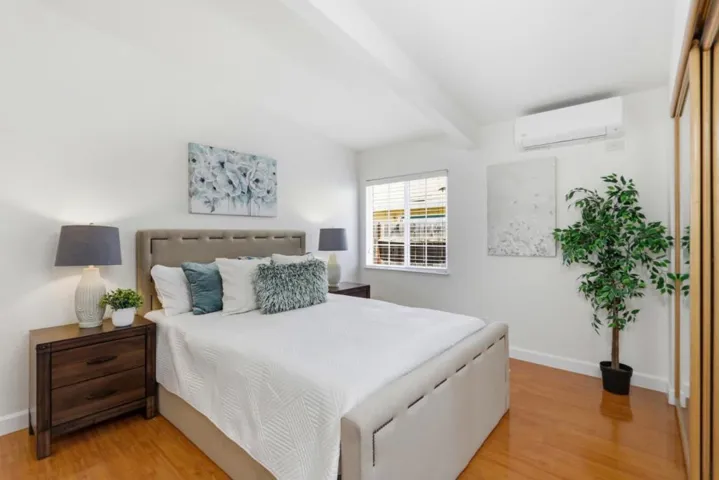 Spacious downstairs primary suite with and a peaceful, light-filled atmosphere.