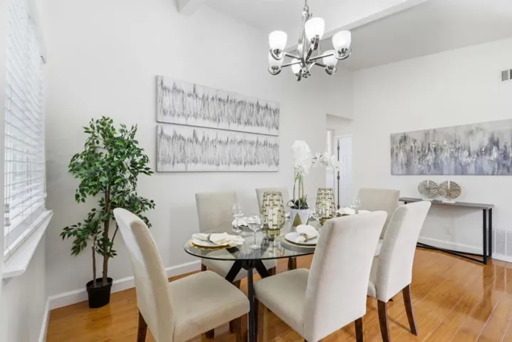 Spacious dining area offering abundant natural light and easy access to the kitchen.