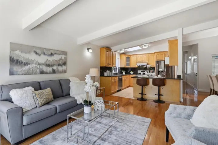 Open-concept family room flowing effortlessly into the kitchen, perfect for everyday living.