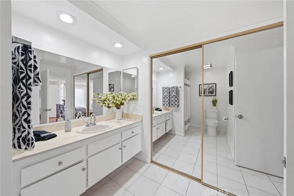Primary bathroom with extra closet.