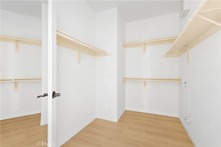 Walk-in closet in primary suite