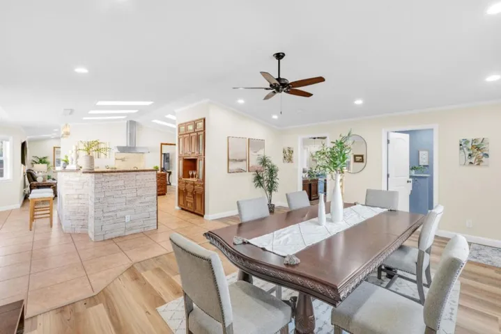 Dining room with direct sight line to the kitchen. Ideal for entertaining.