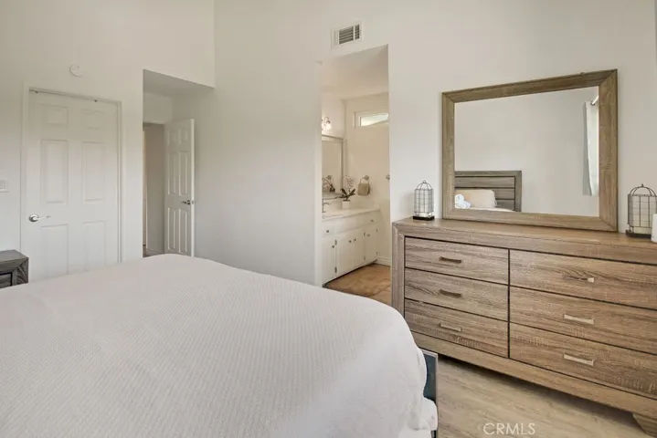 Primary suite with view to primary bath and walk in closet