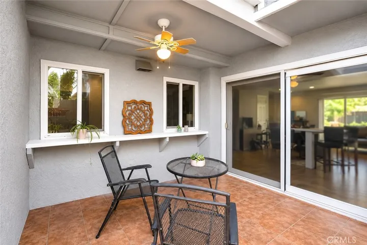 Private covered patio provides the perfect setting for outdoor dining, entertaining, or simply relaxing year-round.