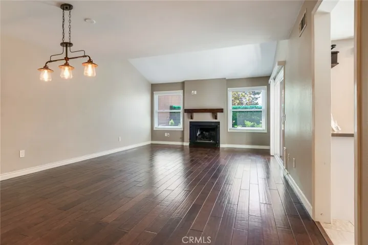 Spacious great room with engineered wood flooring