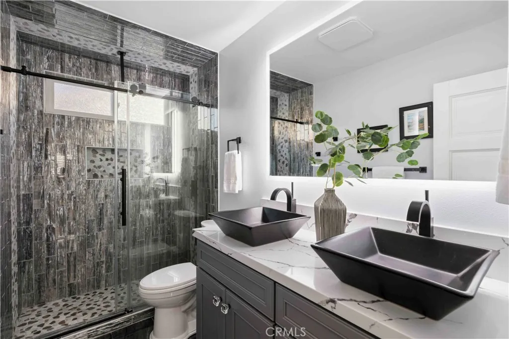 Guest bathroom w/ dual vanities