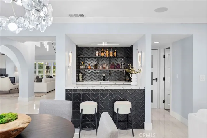 The extensive renovations, premium upgrades, and thoughtful design elements make this home a rare opportunity for buyers seeking a move-in-ready property with resort-style amenities and outstanding attention to detail