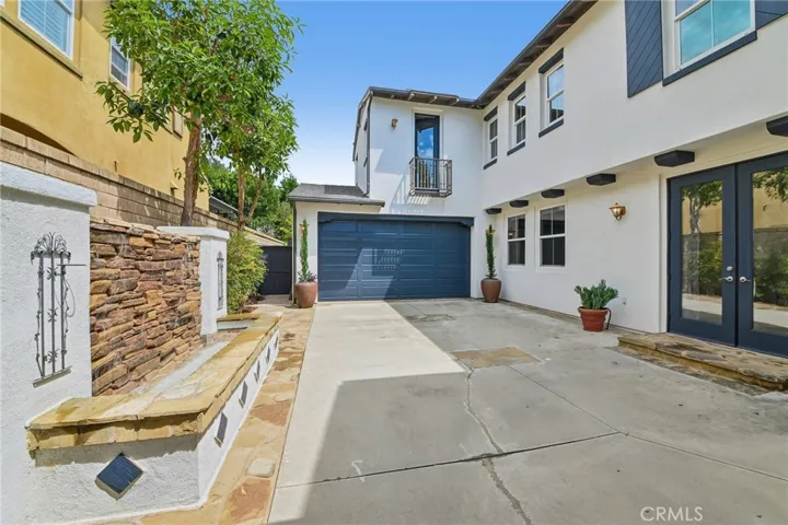 serene fountain with long driveway