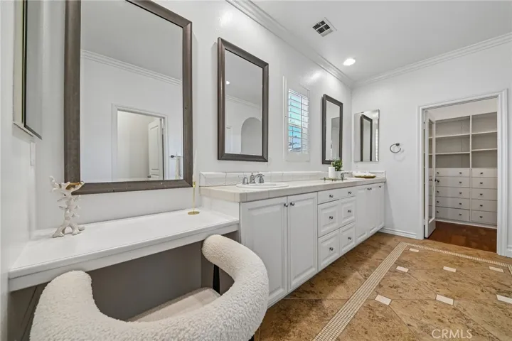 vanity area in primary bathroom