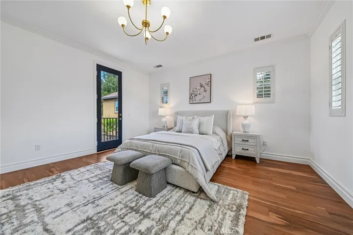 primary bedroom with balcony