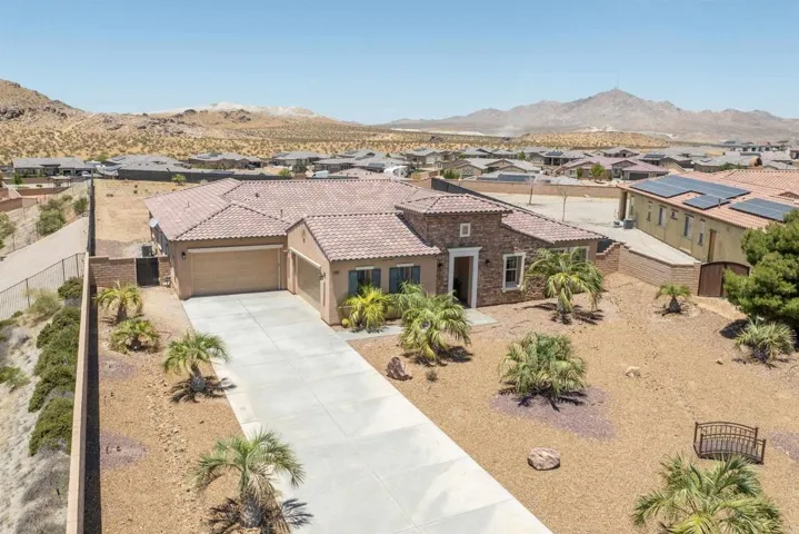 Spacious extended driveway with abundant parking and a welcoming approach to the home.