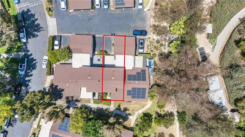 One garage and adjacent spot belong to the home.